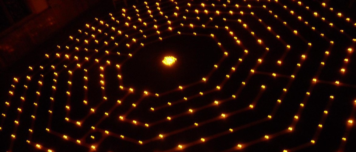 lit candles along the labyrinth